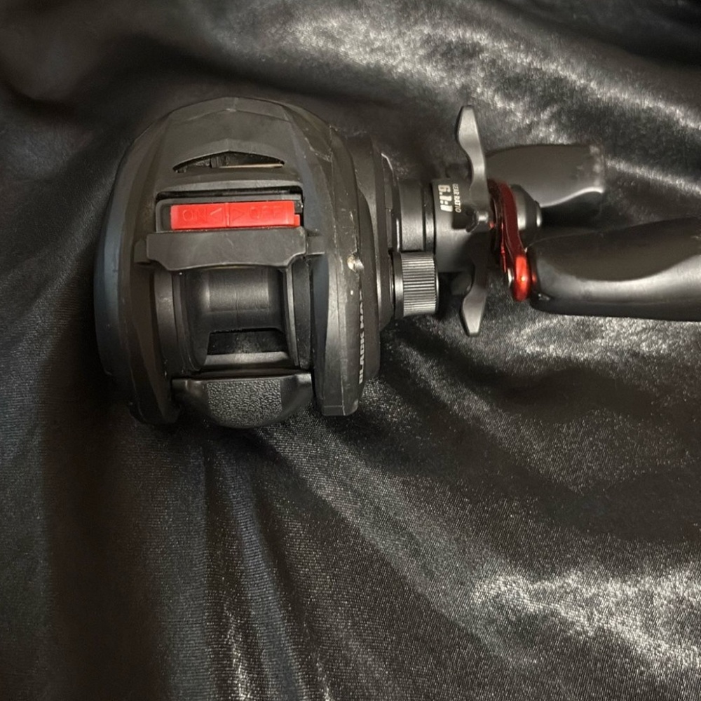 Black and Red Fishing Reel, bait caster